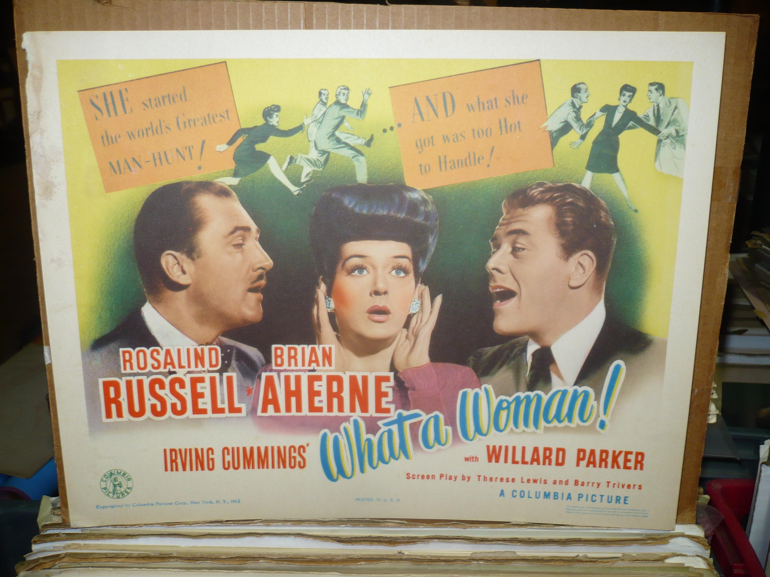 Brian Aherne, Willard Parker, and Rosalind Russell in What a Woman! (1943)