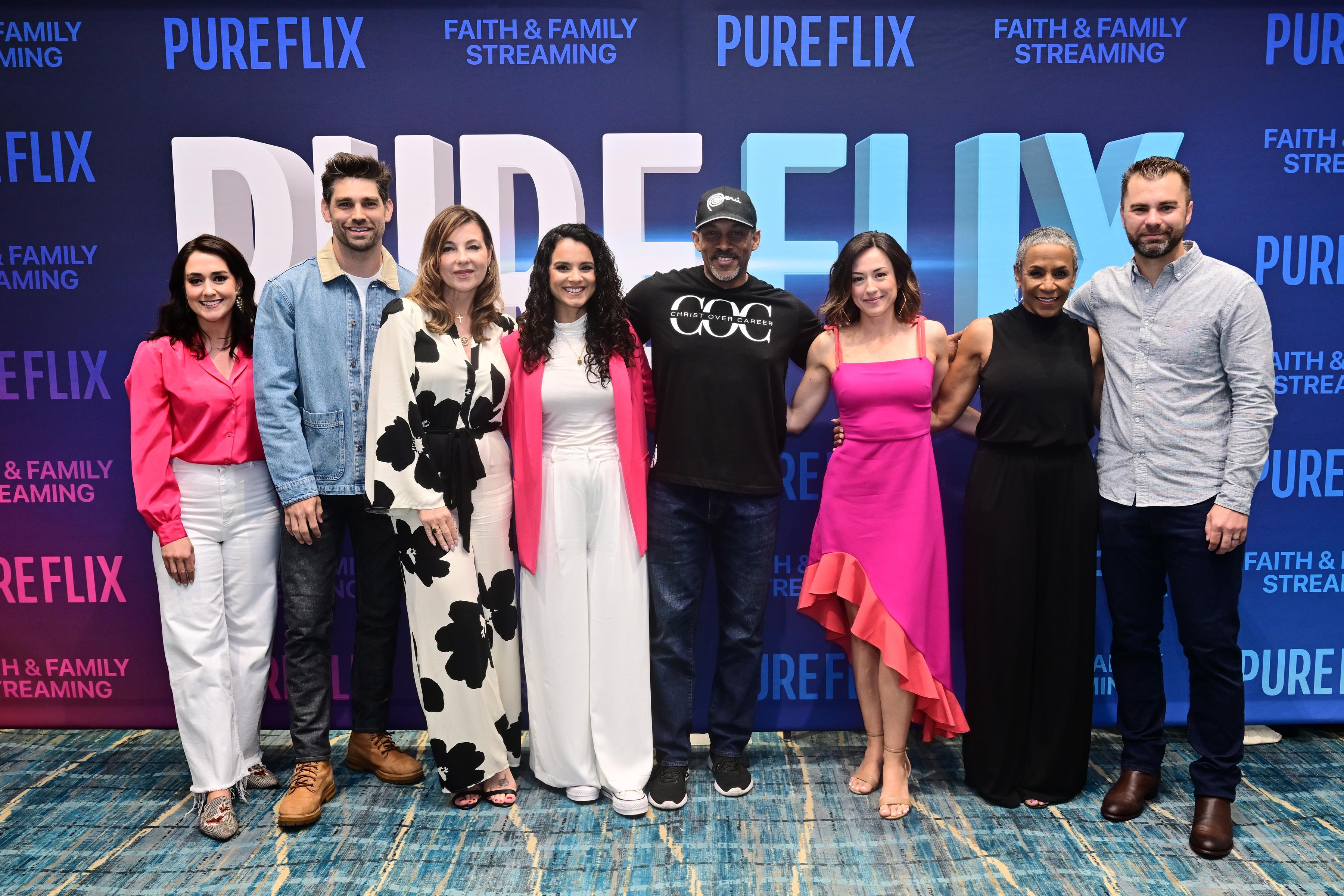 (L-R) Micah Hanson, Justin Gaston, Shari Rigby, Lara Silva, Cameron Arnett, Ashley Bratcher, Karen Abercrombie and Aaron Burns attend Pure Flix At NRB on May 23, 2023 in Orlando, Florida.