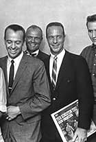 Scott Carpenter, John Glenn, Alan Shepard, John Stewart, The Kingston Trio, Bob Shane, and Nick Reynolds