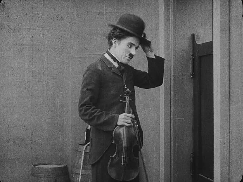 Charles Chaplin in The Vagabond (1916)