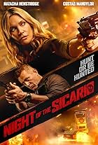 Natasha Henstridge and Costas Mandylor in Night of the Sicario (2021)