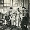 Yuri Belov, Aleksey Kozhevnikov, and Nadezhda Rumyantseva in Nepoddayushchiyesya (1959)