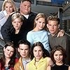 Leslie Bibb, Tamara Mello, Carly Pope, Tammy Lynn Michaels, Christopher Gorham, Leslie Grossman, Bryce Johnson, Ron Lester, and Sara Rue in Popular (1999)