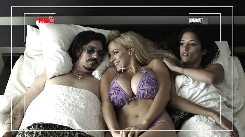 Melanie Winiger, Ronnie Rodriguez, and Jordan Carver in Who Killed Johnny (2013)