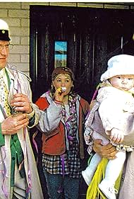 Taneli Mäkelä, Johanna af Schultén, and Helena Kallio in Koti (1995)