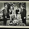 Janis Carter, Eduardo Ciannelli, Vesey O'Davoren, and Franchot Tone in I Love Trouble (1948)