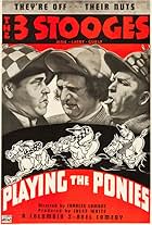 Moe Howard, Larry Fine, and Curly Howard in Playing the Ponies (1937)