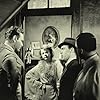 Leif Erickson, Iris Adrian, Myron McCormick, and Hiram Sherman in ...One Third of a Nation... (1939)