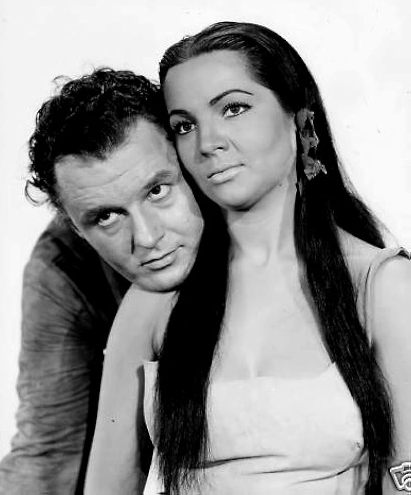 Rod Steiger and Sara Montiel in Run of the Arrow (1957)