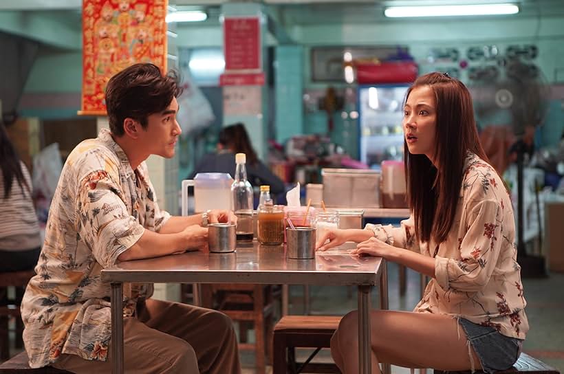 Pimchanok Luevisadpaibul and Nadech Kugimiya in The Con-Heartist (2020)