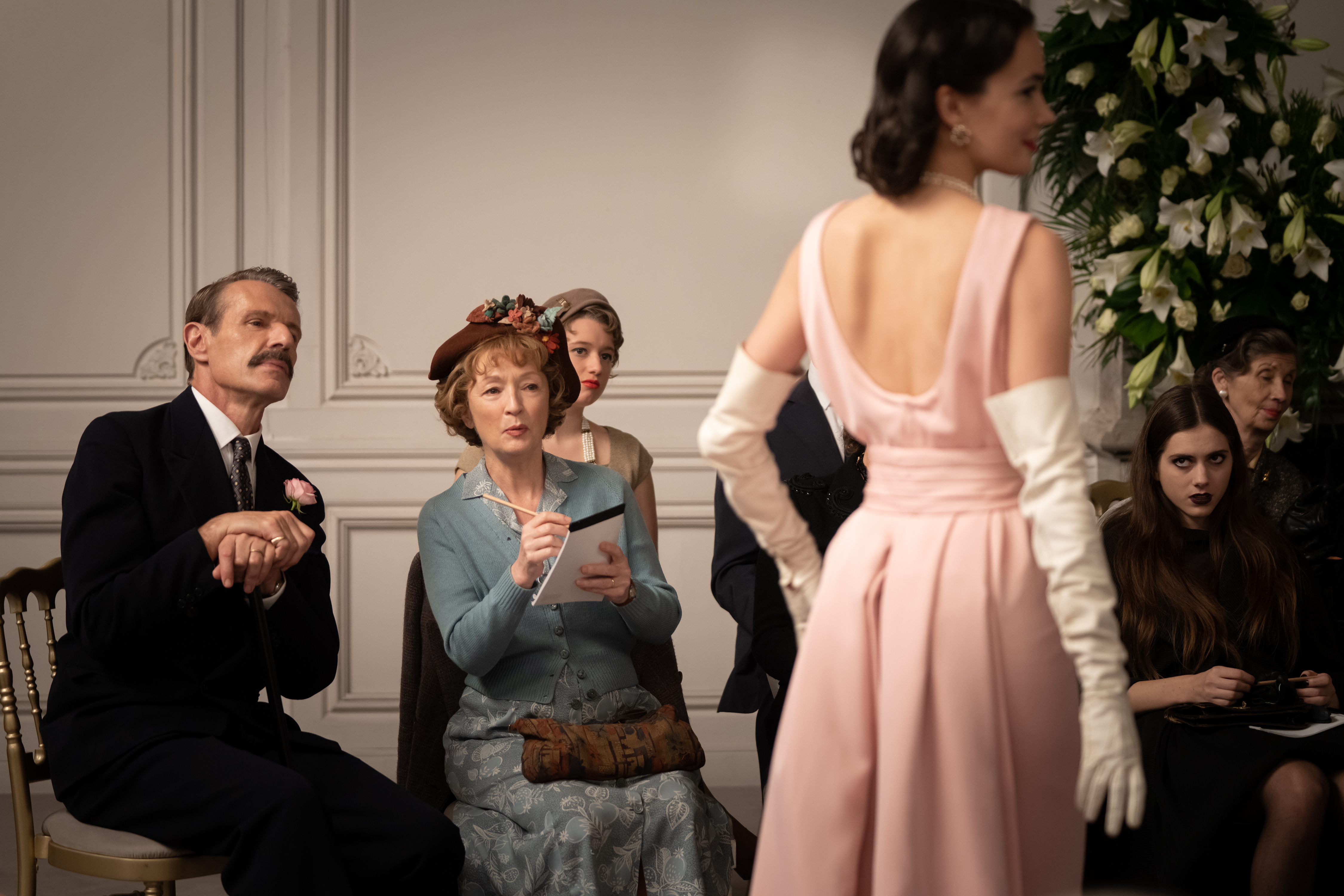 Guilaine Londez, Lesley Manville, Lambert Wilson, Örvendi Cintia, and Dorottya Ilosvai in Mrs. Harris Goes to Paris (2022)