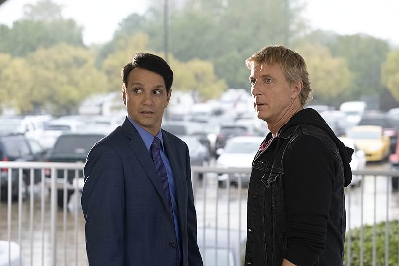 Ralph Macchio and William Zabka in The Good, The Bad, and the Badass (2021)