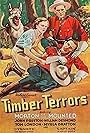 Myrla Bratton, John Preston, and Captain King of Dogs in Timber Terrors (1935)