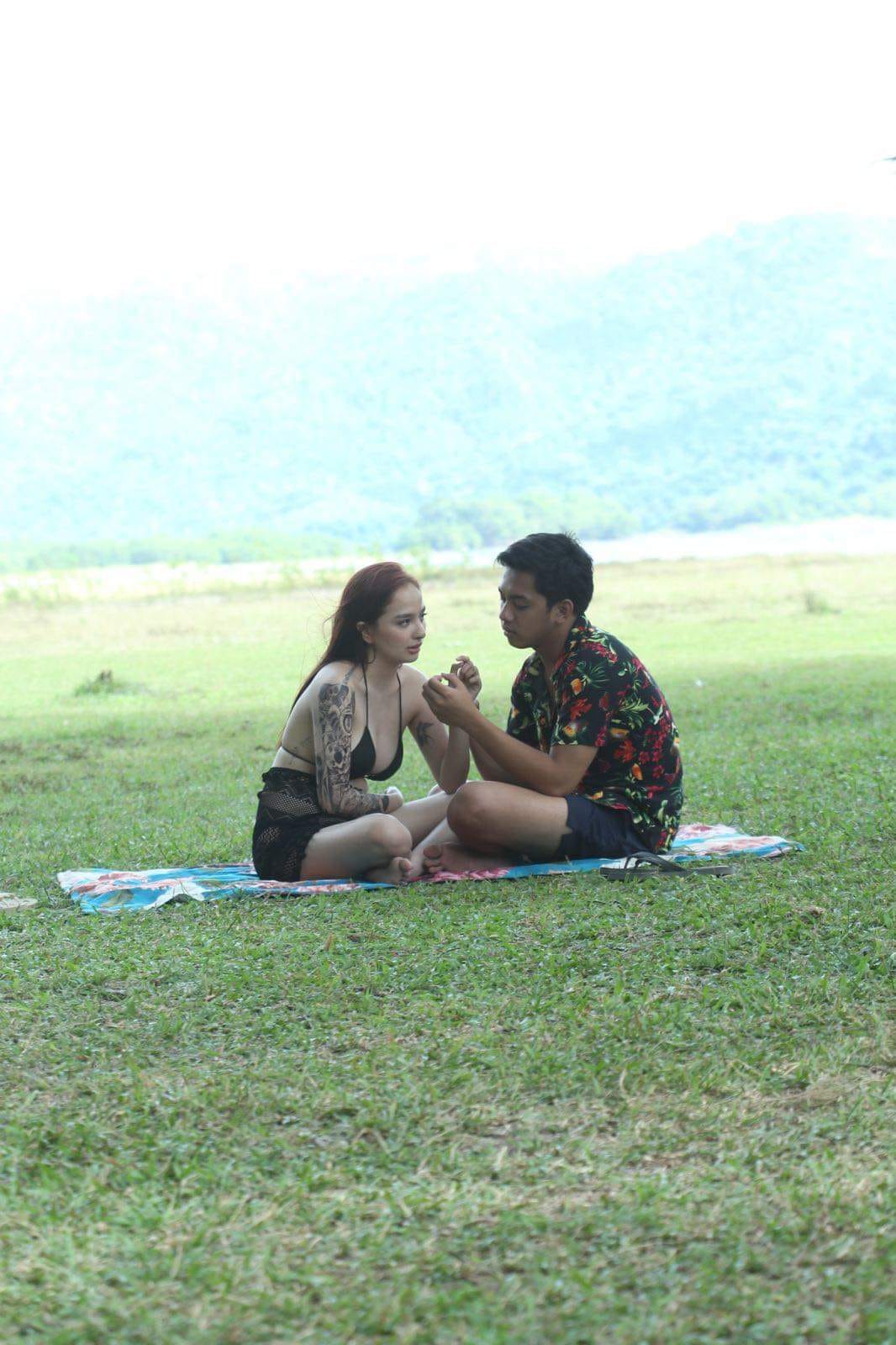 Sean De Guzman and Cara Gonzales in Lawa (2023)