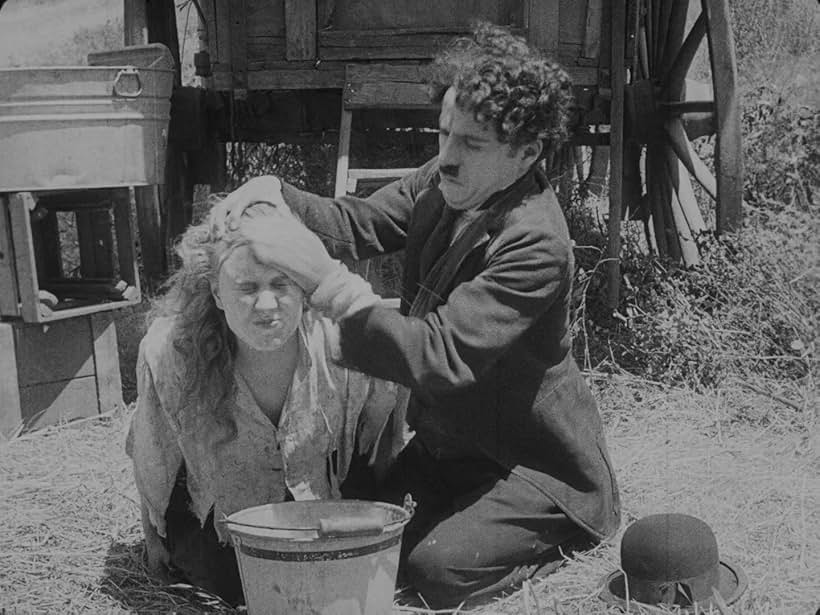 Charles Chaplin and Edna Purviance in The Vagabond (1916)