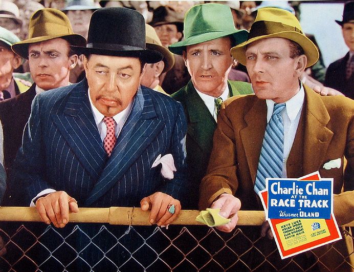 Ivan Miller and Warner Oland in Charlie Chan at the Race Track (1936)