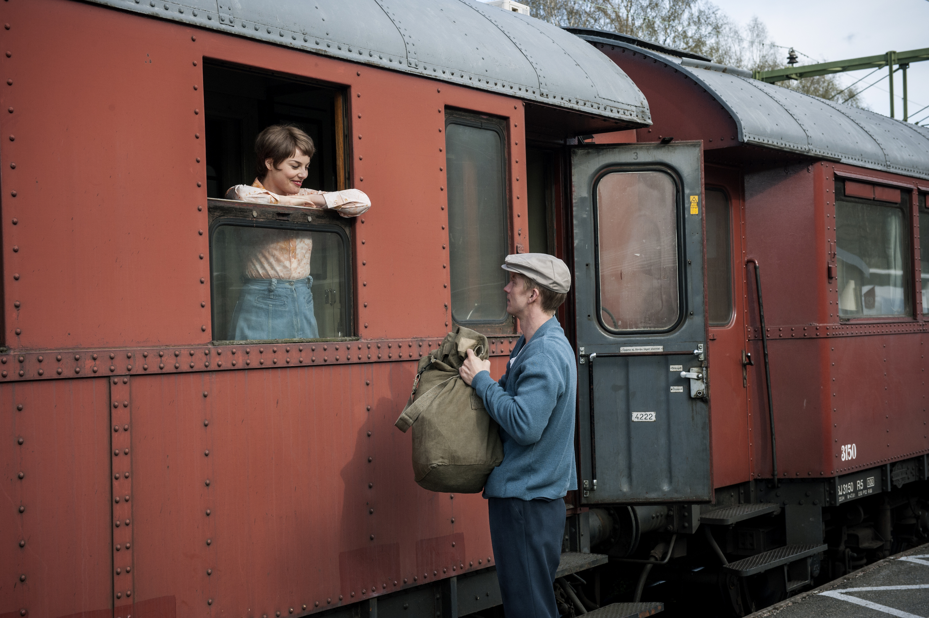 Filip Berg and Ida Engvoll in A Man Called Ove (2015)