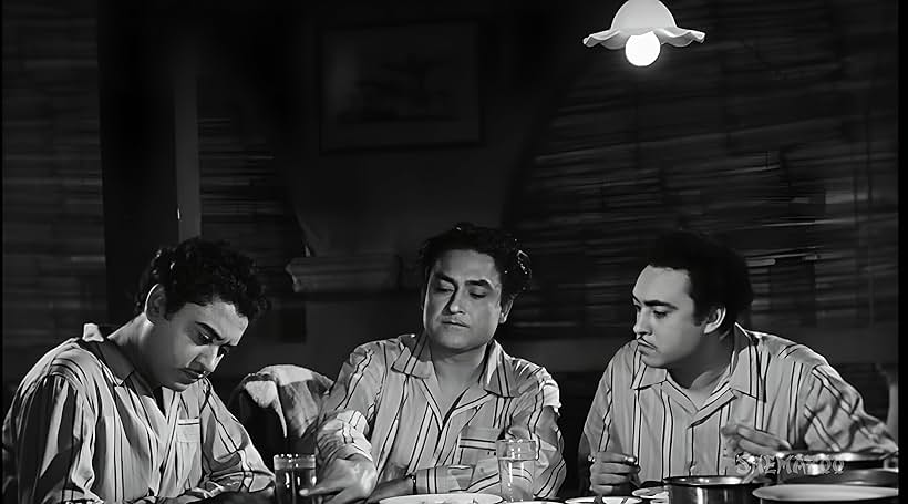 Ashok Kumar, Anoop Kumar, and Kishore Kumar in Chalti Ka Naam Gaadi (1958)