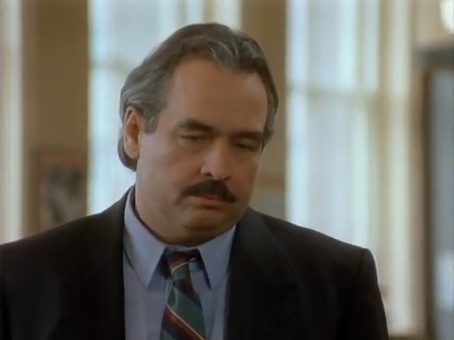 Raymond Bouchard in Scoop (1992)