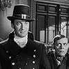 George Sanders and Skelton Knaggs in A Scandal in Paris (1946)