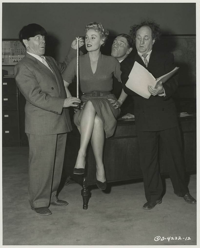 Moe Howard, Larry Fine, Shemp Howard, and Angela Stevens in Blunder Boys (1955)