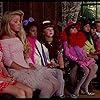 Carla Gugino, Kellie Martin, Ami Foster, Mary Gross, Heather Hopper, Jenny Lewis, Emily Schulman, Tasha Scott, and Aquilina Soriano in Troop Beverly Hills (1989)