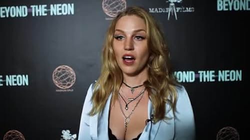 Marisa Dzintars and Woodrow Wilson Hancock III red carpet interview for Beyond the Neon