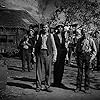 Henry Fonda, John Carradine, Dorris Bowdon, Frank Darien, Darryl Hickman, Shirley Mills, Eddie Quillan, Russell Simpson, Frank Sully, and O.Z. Whitehead in The Grapes of Wrath (1940)