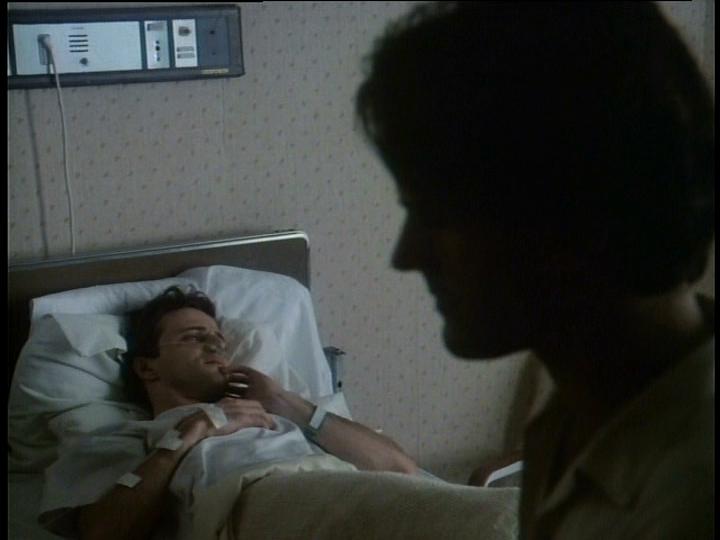 Aidan Quinn and D.W. Moffett in An Early Frost (1985)