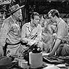 Douglas Fairbanks Jr., Alan Hale, and John Howard in Green Hell (1940)