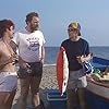 Christopher Fairbank, Gary Holton, and Pat Roach in Auf Wiedersehen, Pet (1983)