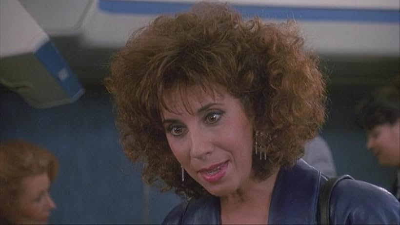 Anne DeSalvo in Taking Care of Business (1990)