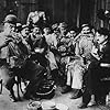 Charles Chaplin, Albert Austin, Eric Campbell, James T. Kelley, John Rand, and Leo White in Behind the Screen (1916)