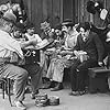 Charles Chaplin, Albert Austin, Eric Campbell, James T. Kelley, John Rand, and Leo White in Behind the Screen (1916)