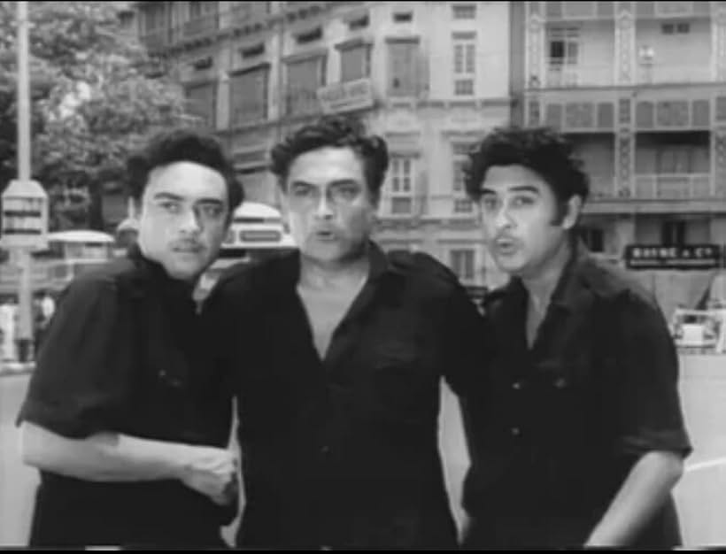 Ashok Kumar, Anoop Kumar, and Kishore Kumar in Chalti Ka Naam Gaadi (1958)