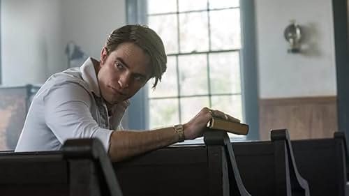 Some people are just born to be buried. 

In Knockemstiff, Ohio and its neighboring backwoods, sinister characters, an unholy preacher (Robert Pattinson), twisted couple (Jason Clarke and Riley Keough), and crooked sheriff (Sebastian Stan), converge around young Arvin Russell (Tom Holland) as he fights the evil forces that threaten him and his family. Spanning the time between World War II and the Vietnam war, director Antonio Campos THE DEVIL ALL THE TIME renders a seductive and horrific landscape that pits the just against the corrupted. Co-starring Bill Skarsgård, Mia Wasikowska, Harry Melling, Haley Bennett, and Pokey LaFarge, this suspenseful, finely-woven tale is adapted from Donald Ray Pollock's award-winning novel.