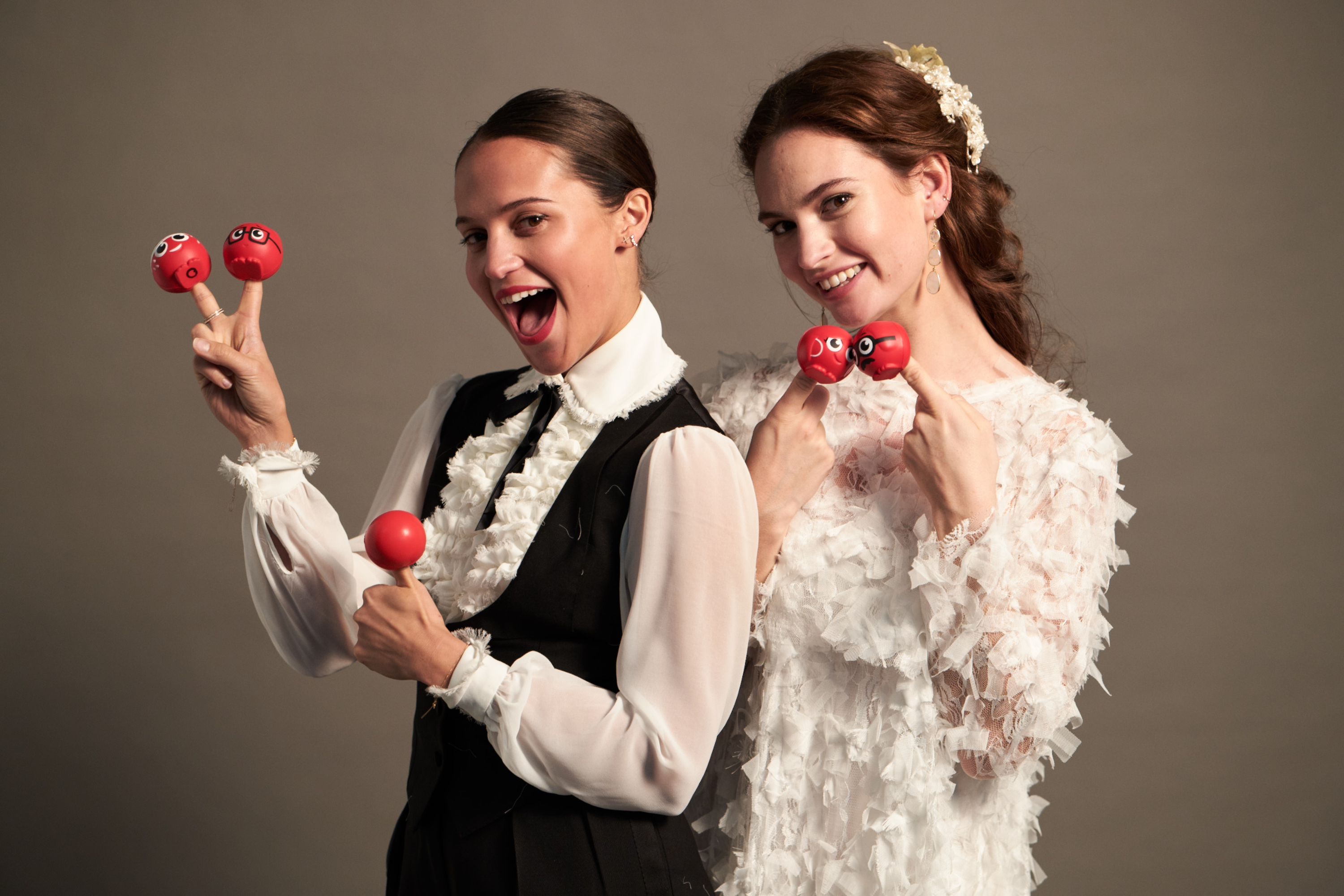 Alicia Vikander and Lily James in One Red Nose and a Wedding (2019)