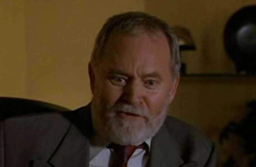 Alan Scarfe in Seven Days (1998)