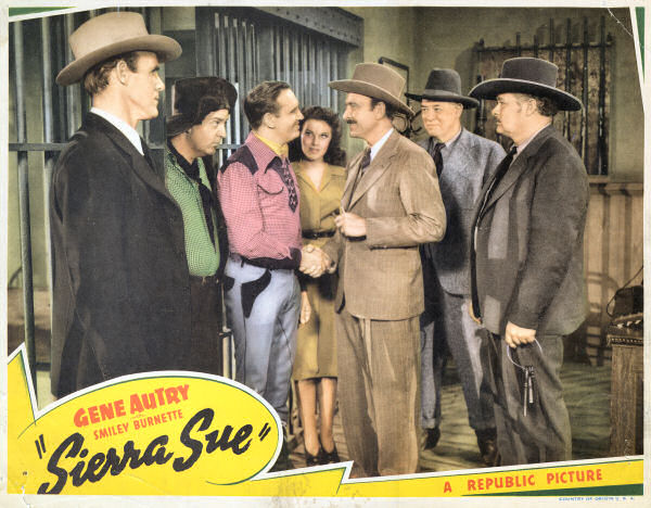 Gene Autry, Smiley Burnette, Robert Homans, Jack Kirk, Kermit Maynard, Fay McKenzie, and Frank M. Thomas in Sierra Sue (1941)