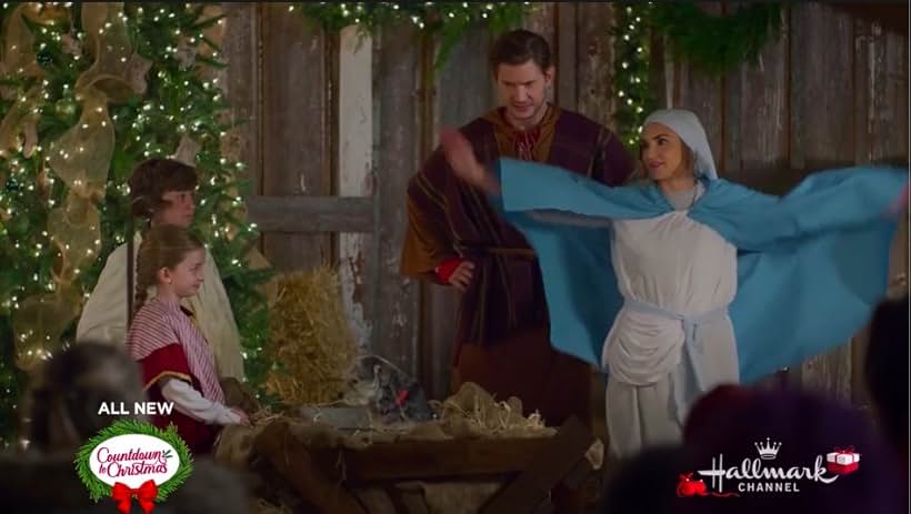 Rachael Leigh Cook, Greyston Holt, Luke Roessler, and Emma Oliver in Cross Country Christmas (2020)