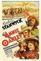 Barbara Stanwyck, Preston Foster, and Moroni Olsen in Annie Oakley (1935)