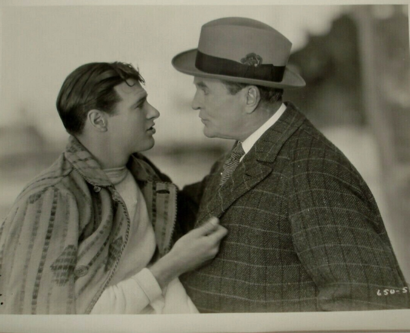 Richard Arlen and David Torrence in Rolled Stockings (1927)