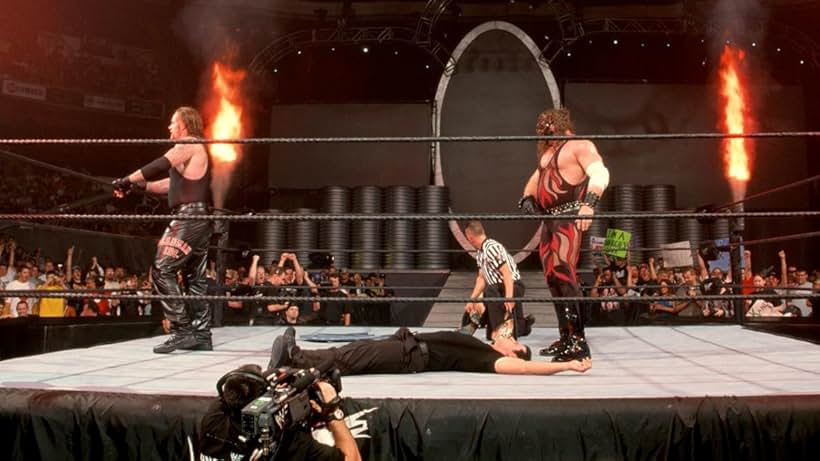 Mark Calaway, Glenn Jacobs, and Michael Manna in WWF Unforgiven (2001)