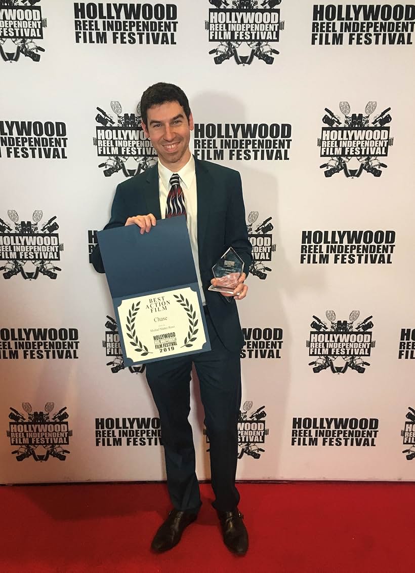 Michael Matteo Rossi winning 'Best Action Film' at the Hollywood Reel Film Festival for Chase