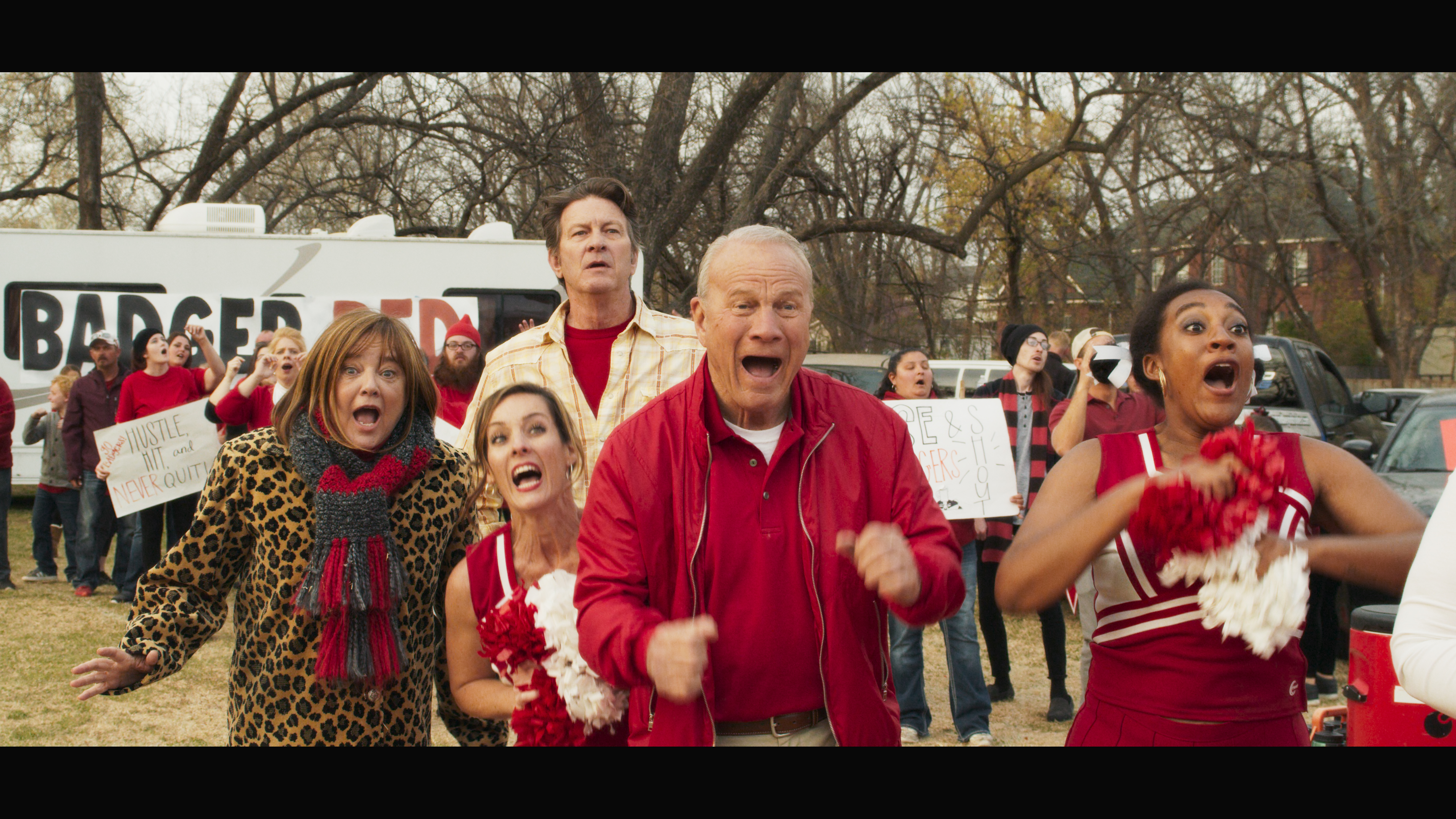 Barry Switzer, Leesa Neidel, and Dazyah Al-Aleem in The Turkey Bowl (2019)