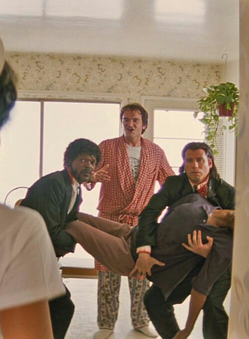 Samuel L. Jackson, Quentin Tarantino, John Travolta, Phil LaMarr, and Venessia Valentino in Pulp Fiction (1994)