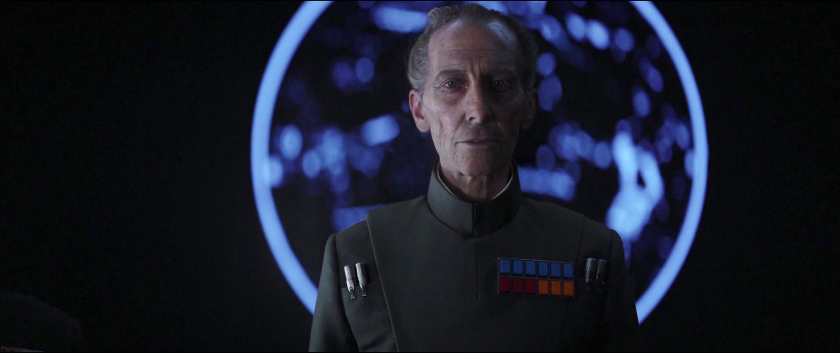 Peter Cushing and Guy Henry in Rogue One: A Star Wars Story (2016)