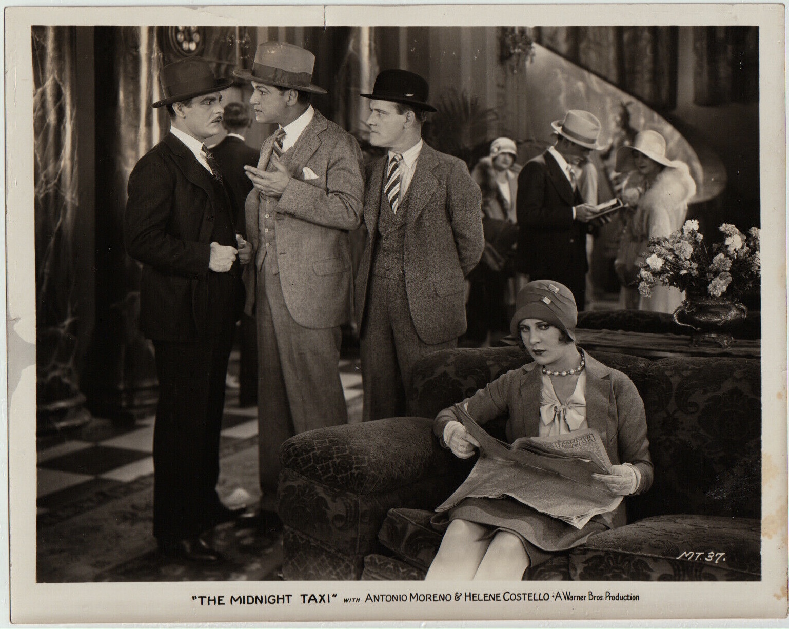 Helene Costello, Tom Dugan, and Antonio Moreno in The Midnight Taxi (1928)