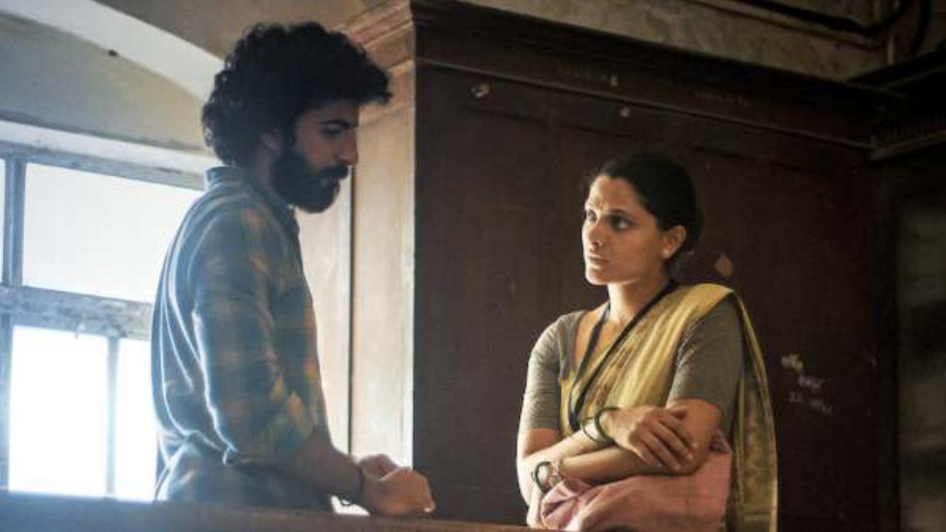 Saiyami Kher and Roshan Mathew in Choked (2020)