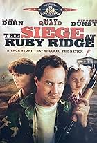 Laura Dern, Kirsten Dunst, and Randy Quaid in The Siege at Ruby Ridge (1996)